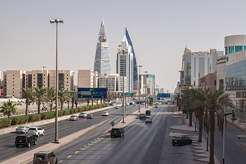 RIYADH, SAUDI ARABIA - OCTOBER 15, 2015. Landscape view at Al Faisaliah tower and other skyscrapers in Riyadh, view from King Fahd road - main street and highway road in Riyadh